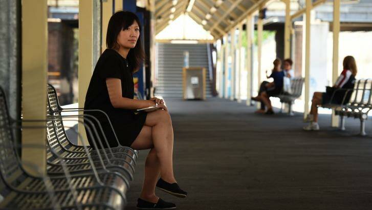 Vivian Feng (left) from West Ryde waits for the train at Chester Hill station.  Photo: Kate Geraghty