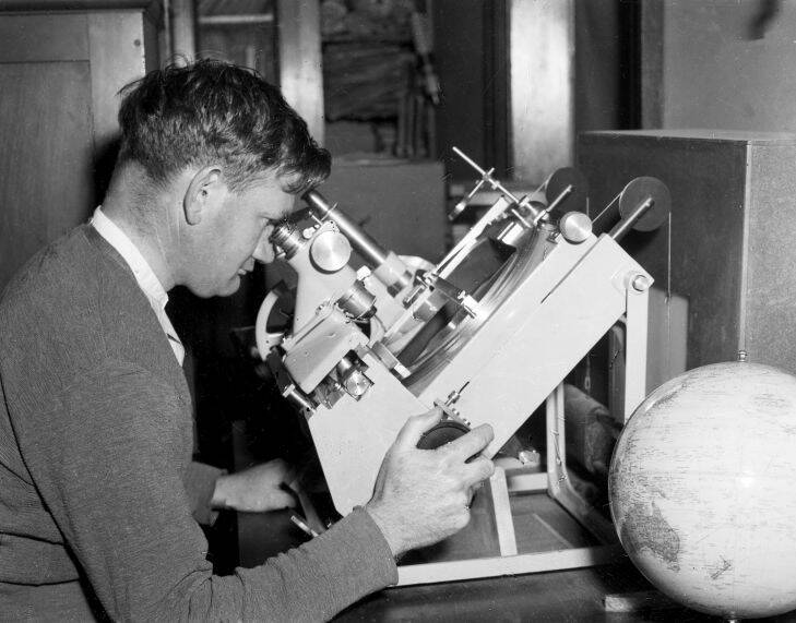 An assistant astronomer tracks the orbit of the Russian satellite, Sputnik I, at the observatory at Robertson, NSW, 9 October 1957.
SMH Picture by BARRY GILMORE

T/4/13/44-46 An assistant astronomer tracks the orbit of the Russian satellite, Sputnik I, at the observatory at Robertson, NSW, 9 October 1957.