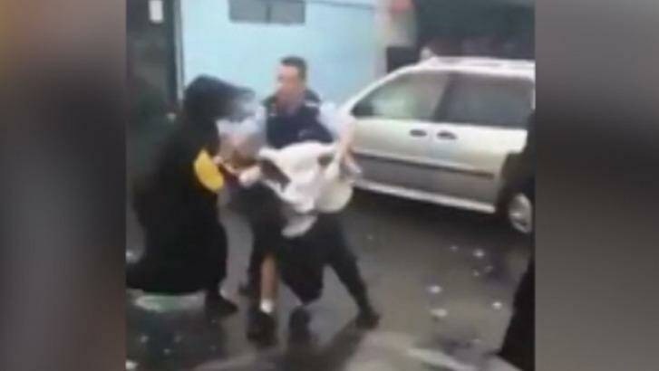 The brawl captured on a mobile phone camera. Photo: Supplied