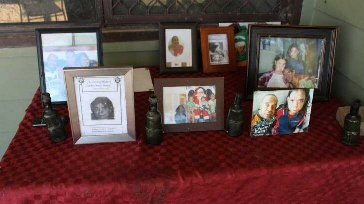 A community memorial set up in Collarenebri for Norman Boney, Sandra Boney and Roger Adams. Photo: ABC/Sarah Whyte