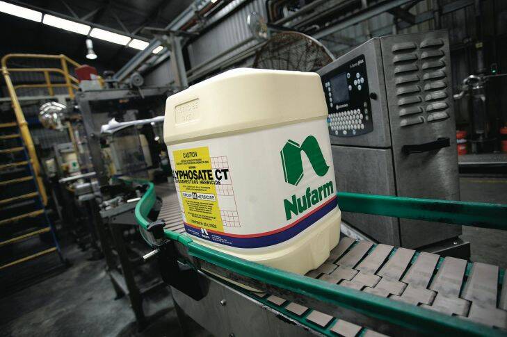 Drums are filled with chemicals along the production line in the warehouse of Nufarm Ltd.'s headquarters, outside of Melbourne, Australia, on Tuesday, Dec. 22, 2009. Sinochem Corp., China's largest chemicals trader, lowered its offer for Nufarm Ltd. by 7.7 percent to A$2.6 billion ($2.3 billion) after completing a study of its target's finances and missing an earlier deadline. Photographer: Luis Enrique Ascui/Bloomberg