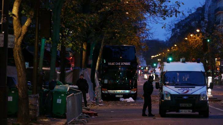 Police at Boulevard Voltaire near the Bataclan theatre in Paris, France on Sunday. Photo: Andrew Meares