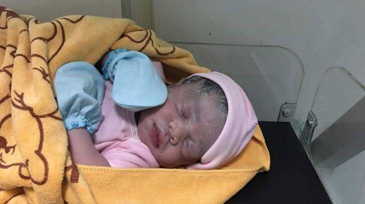 Cambodian Lux Clinic posted a photo of a minutes-old baby girl on Facebook following Hour Vanny's cesarean section on August 25. The surrogate mother confirmed the girl was the baby she carried. Photo: Facebook/Lux Clinic
