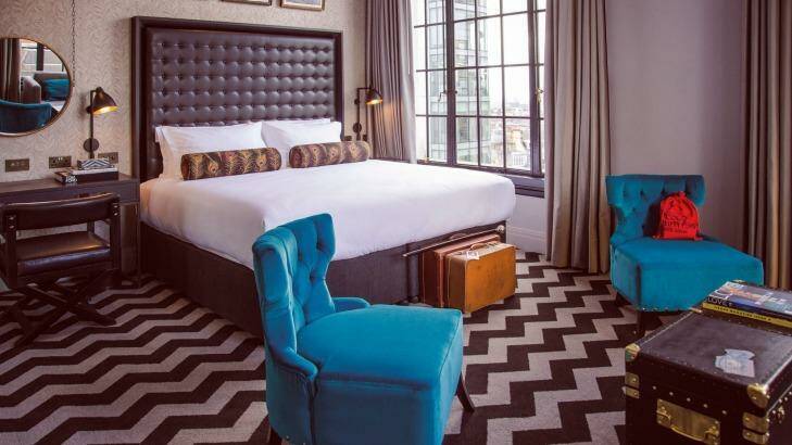 Artfully placed furnishings, money bag included, are a feature of Manchester's Hotel Gotham. Photo: Supplied