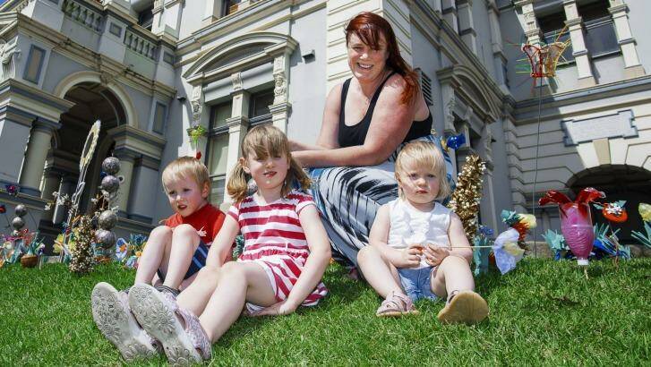 Kate Walsh with her kids Quinn 5, Aidan 4 and Niamh 1 at Leichhardt Town Hall.  Photo: Christopher Pearce