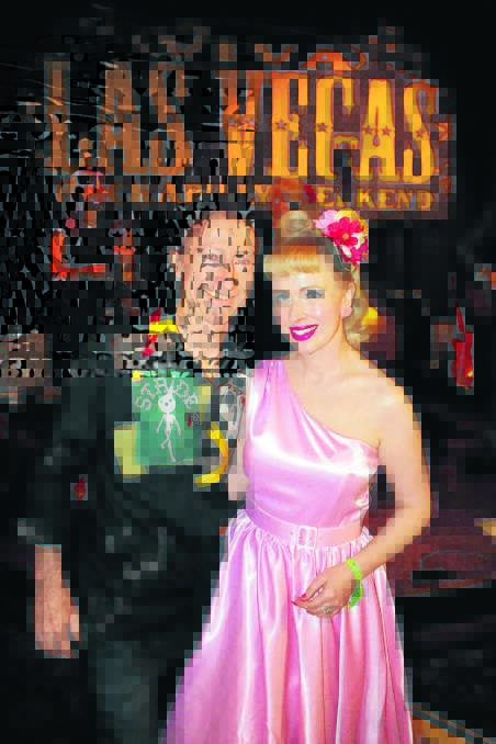 ON THE MOVE: Here's a pic of Lawrie and Shelley Minson in Las Vegas last year at a rockabilly festival. You don't have to travel to Vegas to see them tomorrow night. They're at The Pub on Gunnedah Rd.