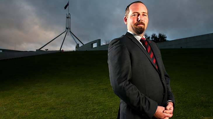 Alone together: Australian Motoring Enthusiast Party's Ricky Muir, at Parliament House for his first week as a senator. Photo:  Alex Ellinghausen