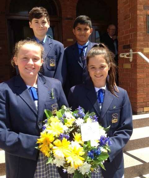 Tamworth Public's (back left) Xavier Radford, Jason Liyanarachchi. Front Georgia Stoddard and Halle Scarth represented their school at the Town Hall Remembrance Day service