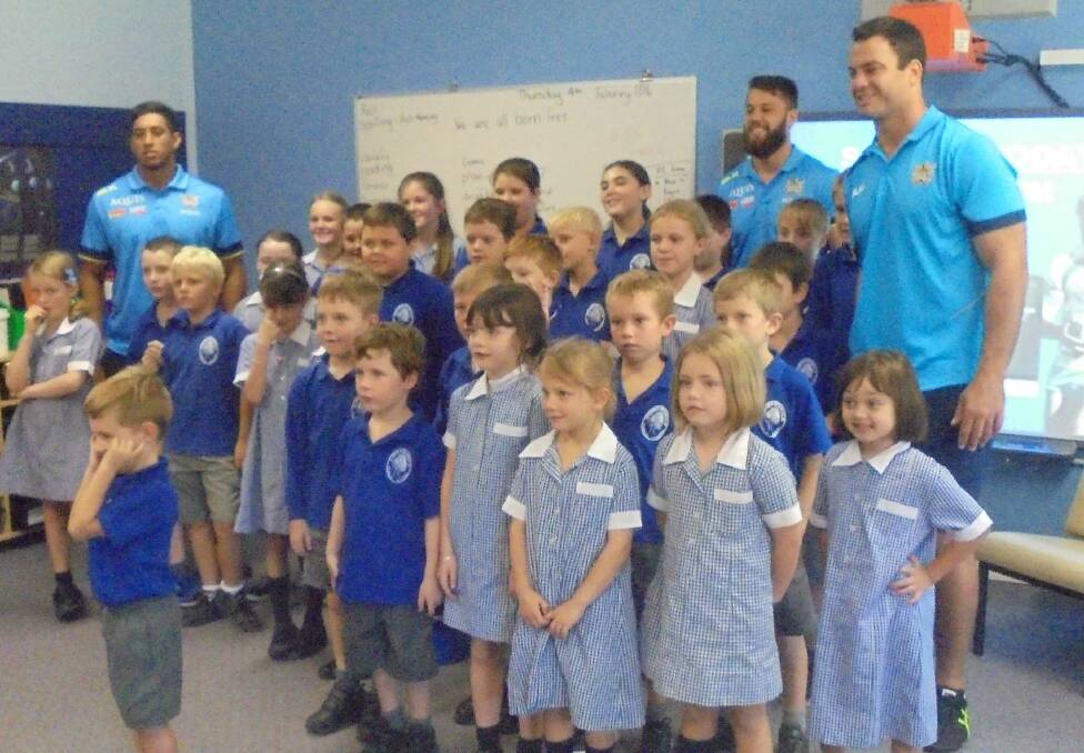 Currabubula students with the NRL Gold Coast Titan players who visited the school