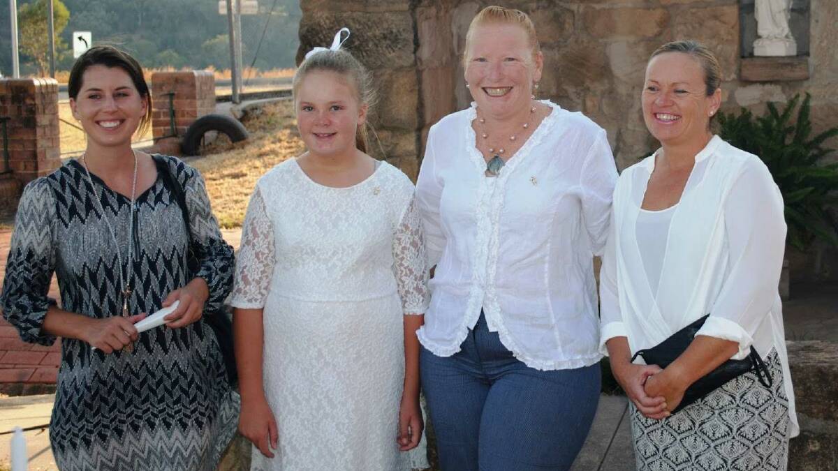 From left Sarah Cudmore, Amelia Seymour, Kelly Stackman, Coral Seymour shared their Sacrament of Confirmation on Easter Saturday with family, friends and the St Joseph’s Quirindi community.