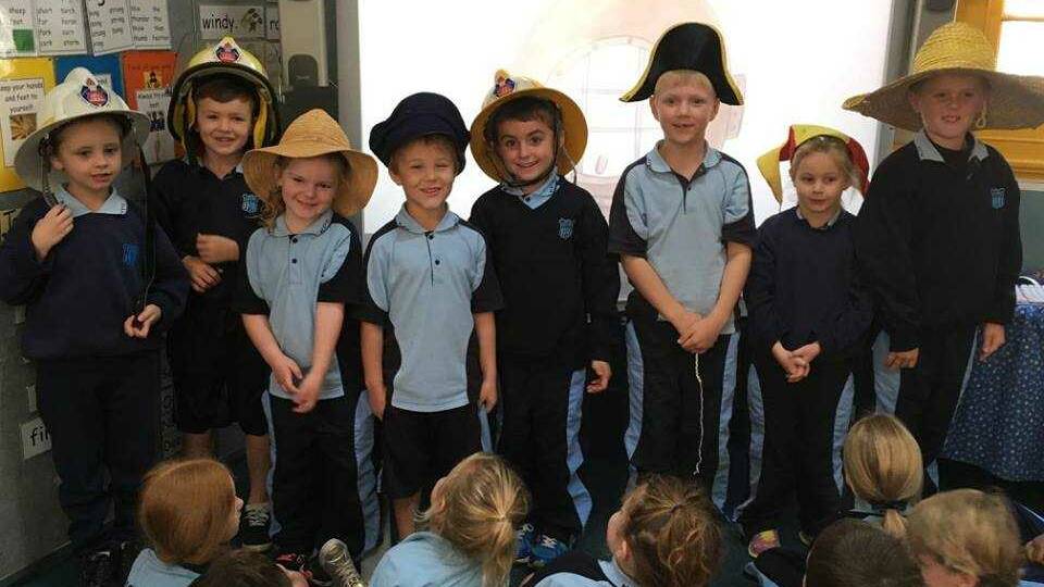 Kootingal Kinder and Year 1 students show off their hats, from left: Hayden Cook, Cooper Higgins, Torah Humphris, Billy Jones, Matthew Pollard, Menno Wallace, Phoebe Vernon and Riley Robinson