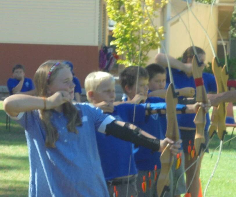 Currabubula's archery group Kitty Compton, Alex Nibbering, Kayne Campbell, Max Bonner and Klaudia Crump in action