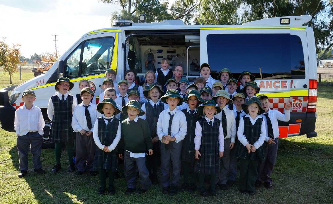 Willow Tree students with ambulance officer Julie during her visit to the school
