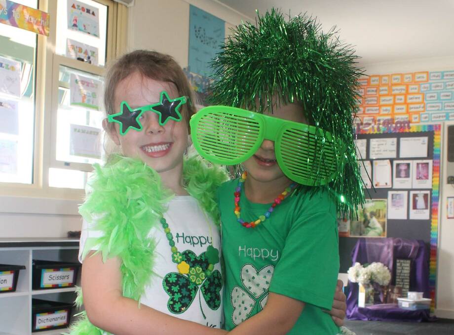 St Edward's Juliet Mettam and Annie O'Neill wore matching Irish outfits made by their grandma