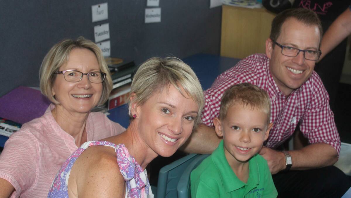 St Edward’s 3G student Sam Studte and his family, Jan Hayes, Natalie and Robert Studte, worked in the classroom together during Catholic Schools Week