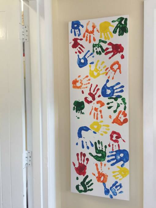 The new Wallabadah Public School canvas now hangs in pride of place in the school office