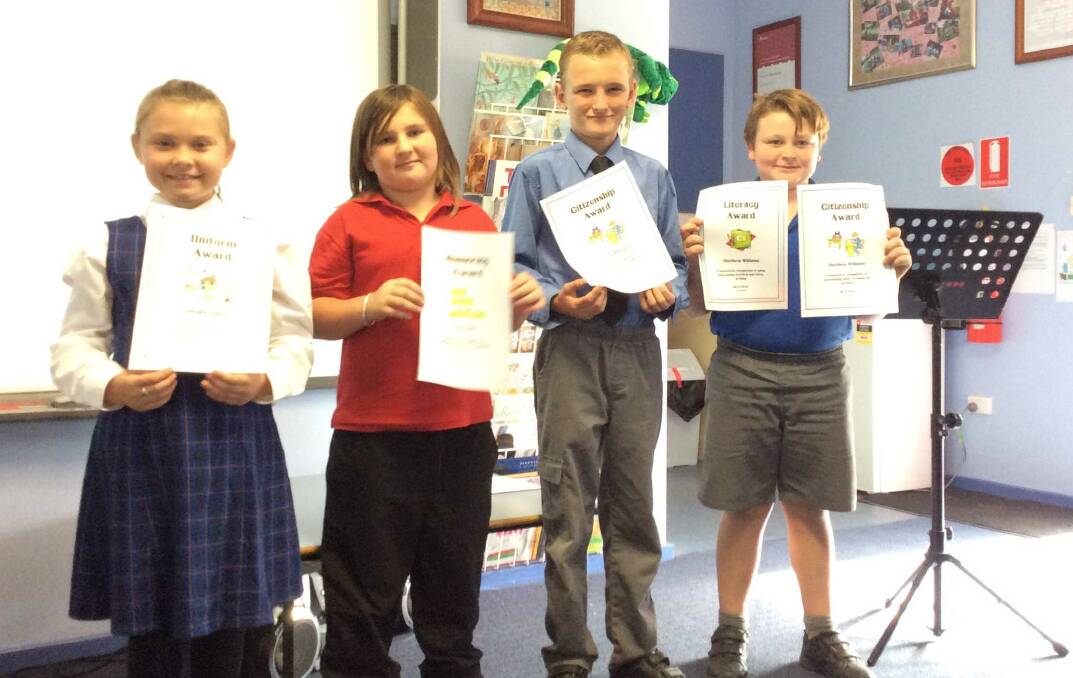 Carroll Year 3 -6 merit awards were given to (from l) Taleigha Elphick, Steph Faint, Corey Wheeler and Matthew Williams