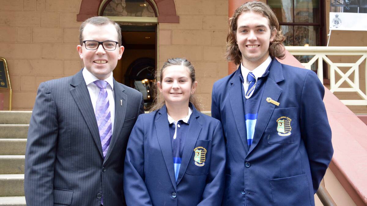 Northern Tablelands MP Adam Marshall on the steps of State Parliament with Guyra Central School captains Hope McClure and Huw Knox