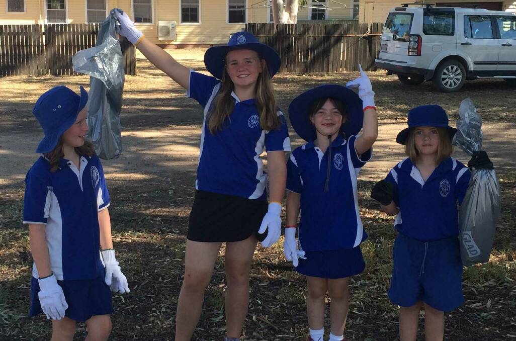 Currabubula’s girls clean up crew Faith Dolahenty, Kitty Compton, Sophie Vincent and Nigella Bonner