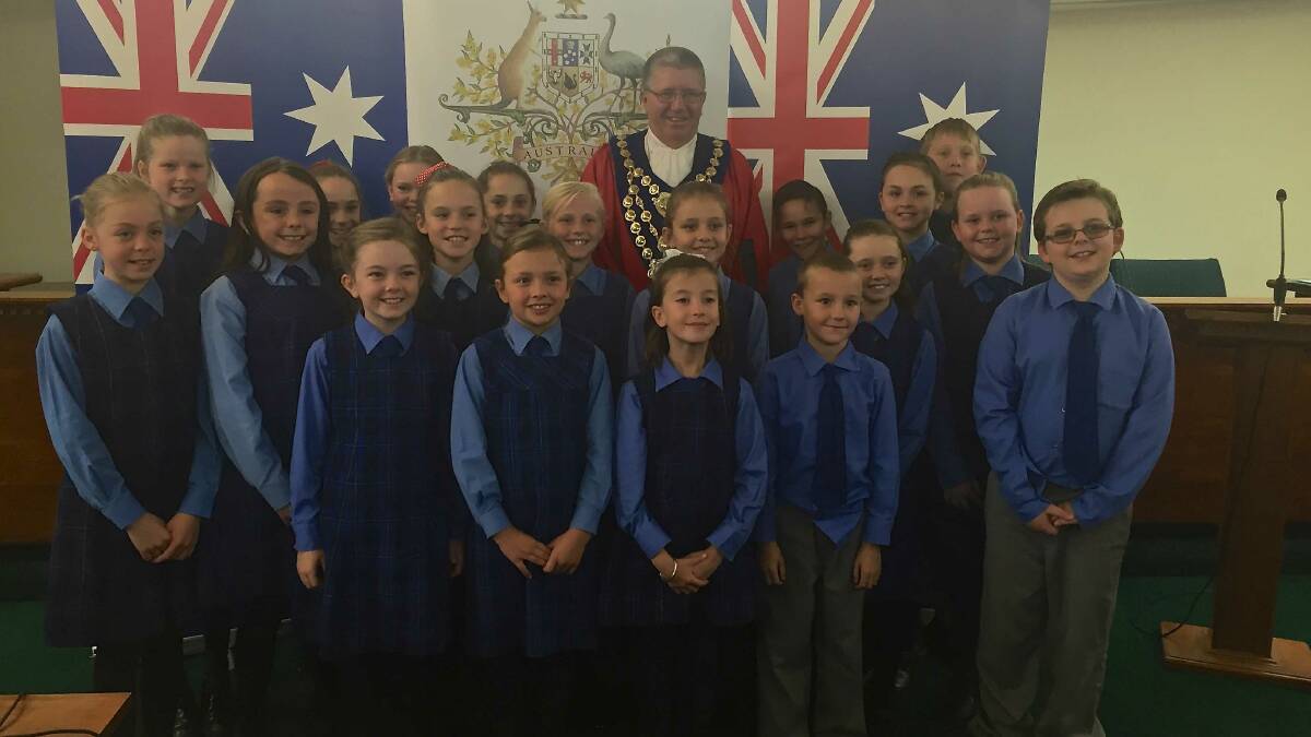 The Timbumburi School choir with Tamworth mayor councillor Col Murray after the citizenship ceremony.
