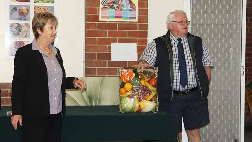 Gail Nolan and David Rodgers conducted an auction during Farrer’s biggest morning tea.