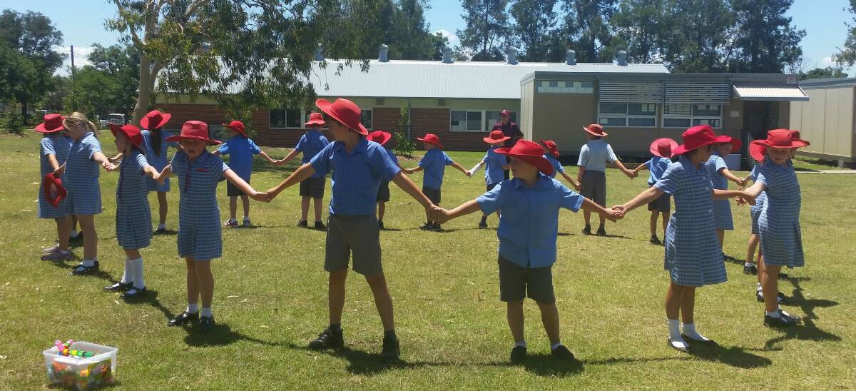 3T formed a circle to demonstrate how the Earth rotates and how the sun castes shadows