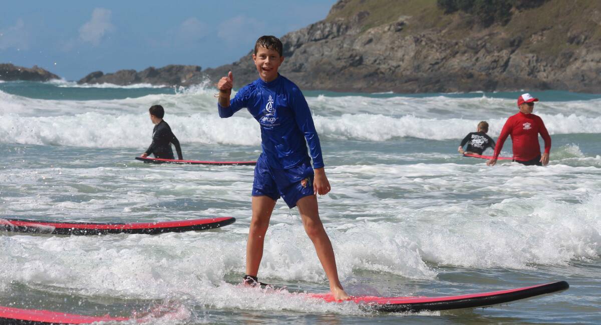 Hamish McPherson hangs ten. Not a bad day for school... Calrossy's Year 7 boys recently went surfing at Coff Harbour