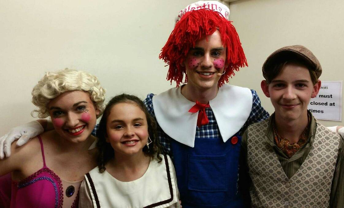Past and present Timbumburi students Sarah Nash, Alicia Turner, Geordie Brown and Stuart McAdam back stage at the Tamworth Musical Society's production of Mary Poppins