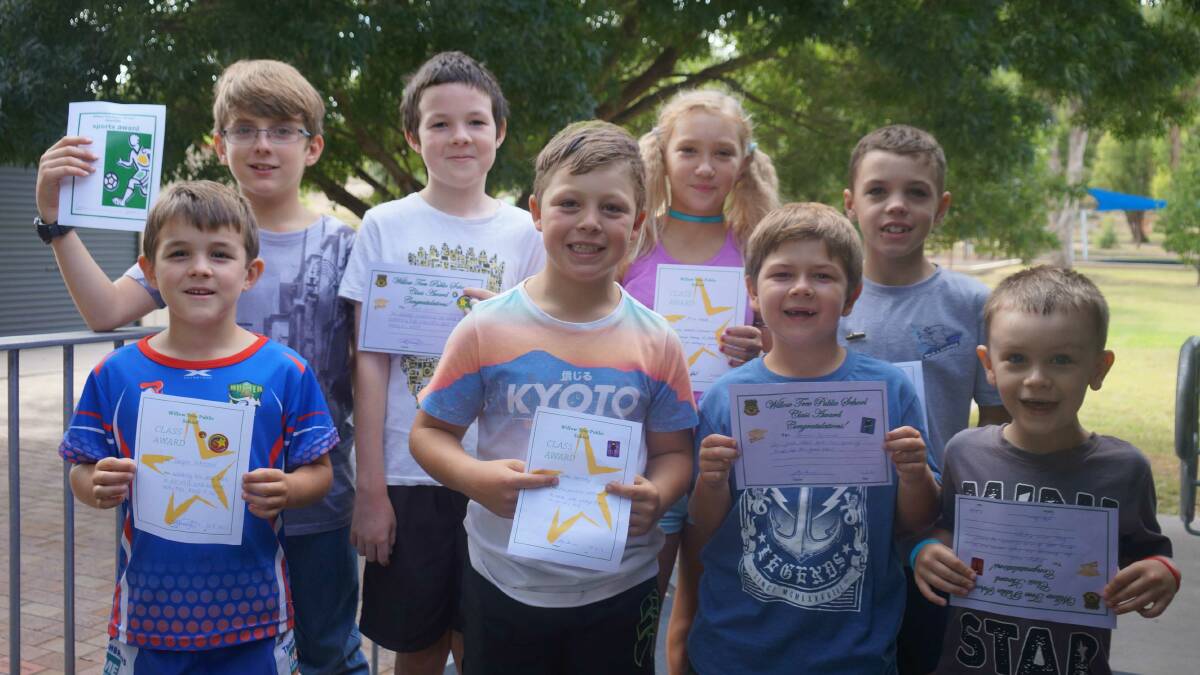 Back from left, Ned Swain, Sean Jones, Alecia Needs and Kyle Sternbeck. Front from left, Cooper Johnson, Jake Wamsley, Damien Symonds and Kiptyn Lowe received awards at the Willow Tree assembly.