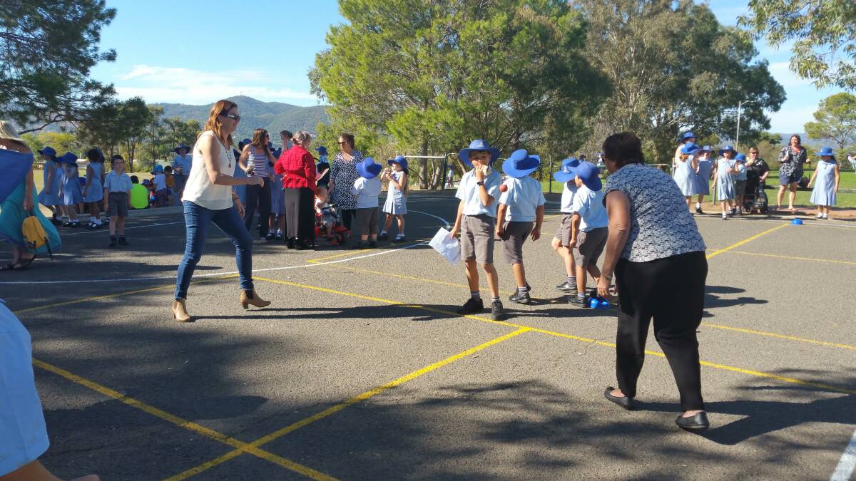 Donna Graham and Evonne Sherwood battle it out on the Handball court. The chief umpire of the game was Tyler Swift.