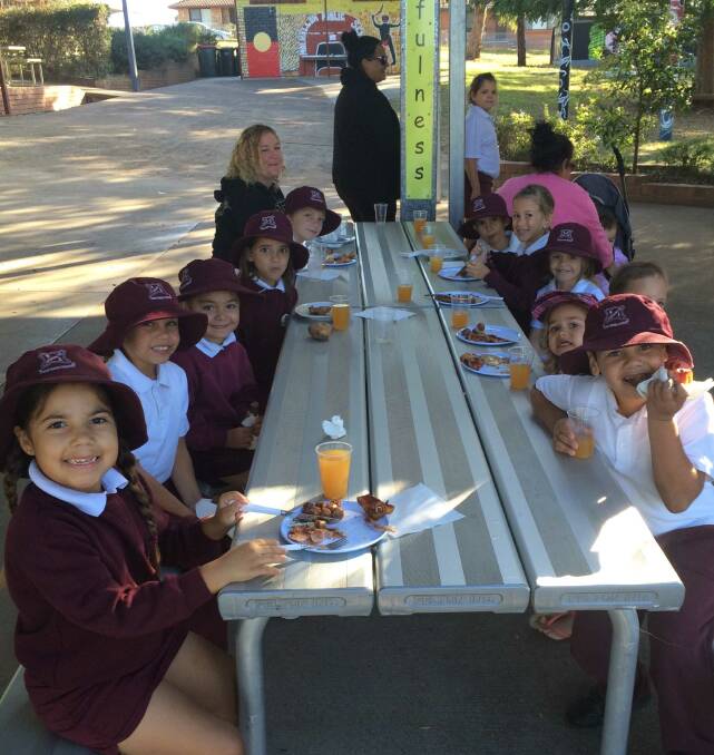 Students at Walhallow Public School celebrate Walk Safely to School Day with a barbecue breakfast.