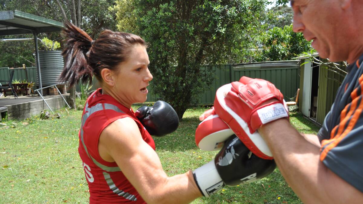 Off to Scotland for the Commonwealth Games: Boxing Australia head coach, Bodo Andreas, training in Shelley Watts' backyard.