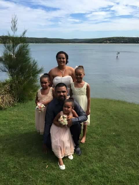 FAMILY MAN: Buddy Nean and Leteasha Darlington with their daughters.