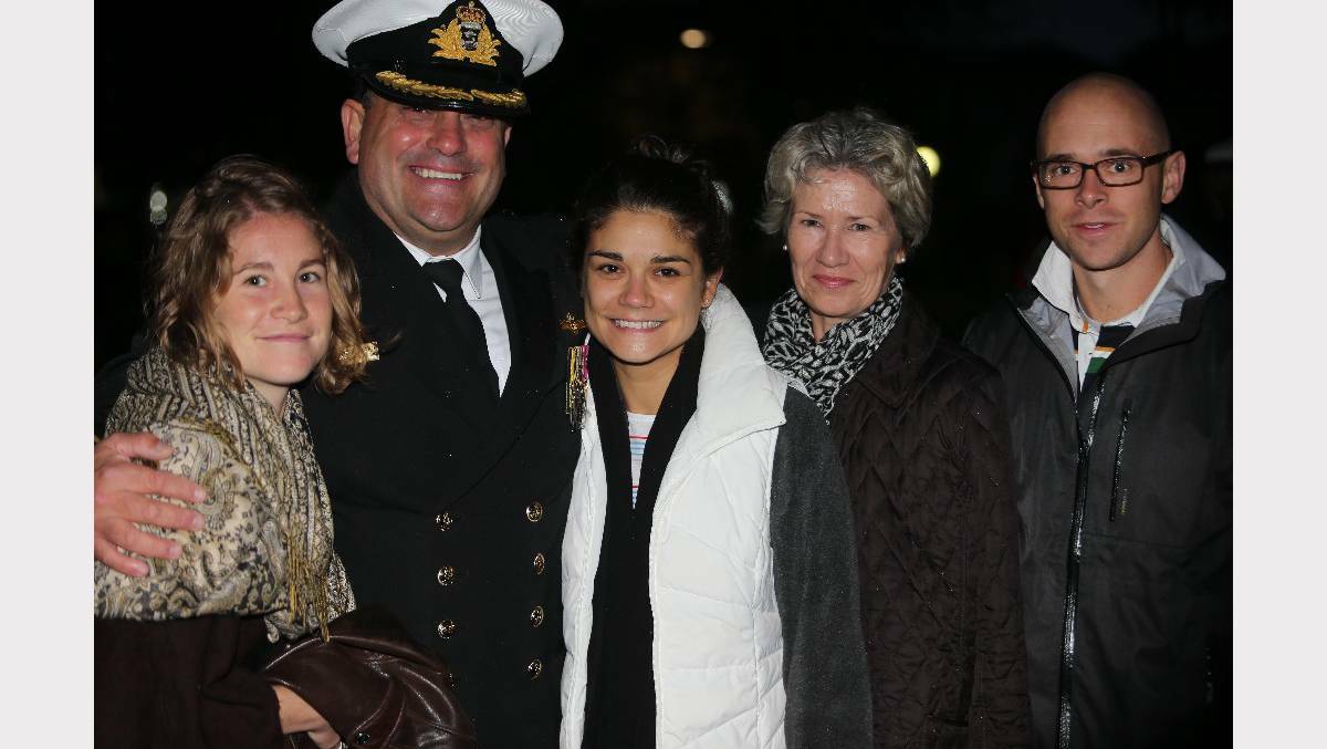 GREENWELL POINT: Commander of the Fleet Air Arm, Commodore Vince Di Pietro gave the address at the Anzac Day dawn service. He is pictured with wife Sandy, daughters Olivia and Flavia and Sam Harrington. Photo: The South Coast Register.