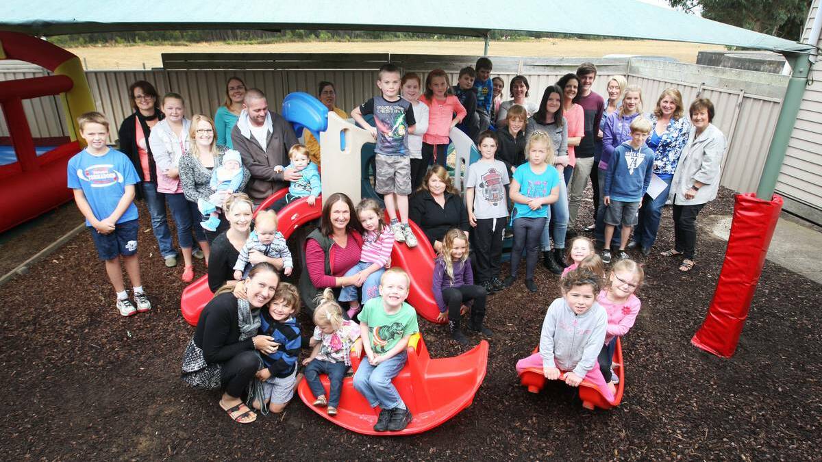 Parents and children celebrating the 20th anniversary of the Ecklin playgroup. Picture: ANGELA MILNE, The Standard.