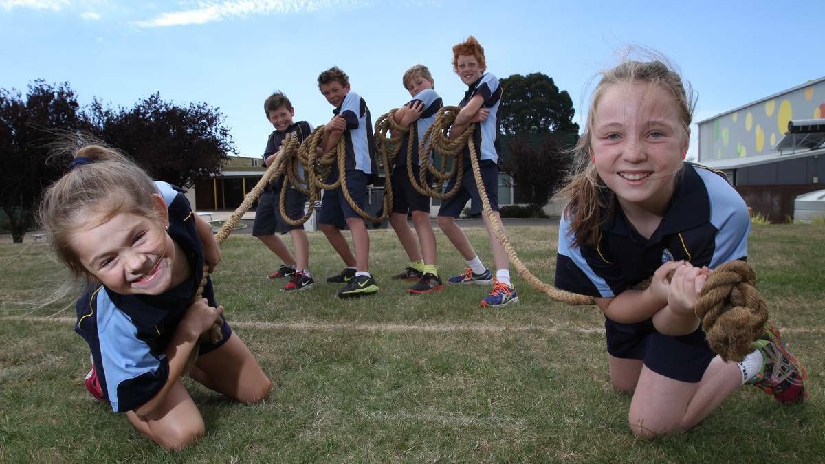 PUT TO THE TEST: Grade 5 Burnie Primary pupils (from left) Molly Walsh, 10, Lachlan Spurr, 10, Alec Mollison, 11, Thomas Wiseman, 10, and Zoe Mott, 10, get in some strength training with the schools tug of war rope ahead of the Burnie Challenge. Picture: Katrina Dodd, The Advocate.