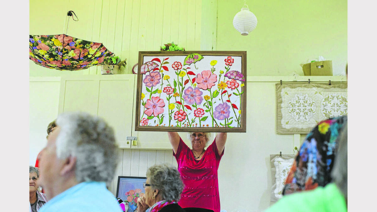 PARKES: The Anglican Women of Australia auction at All Things Flowers provided a lot of fun and some beautiful items for purchase. Western Advocate.