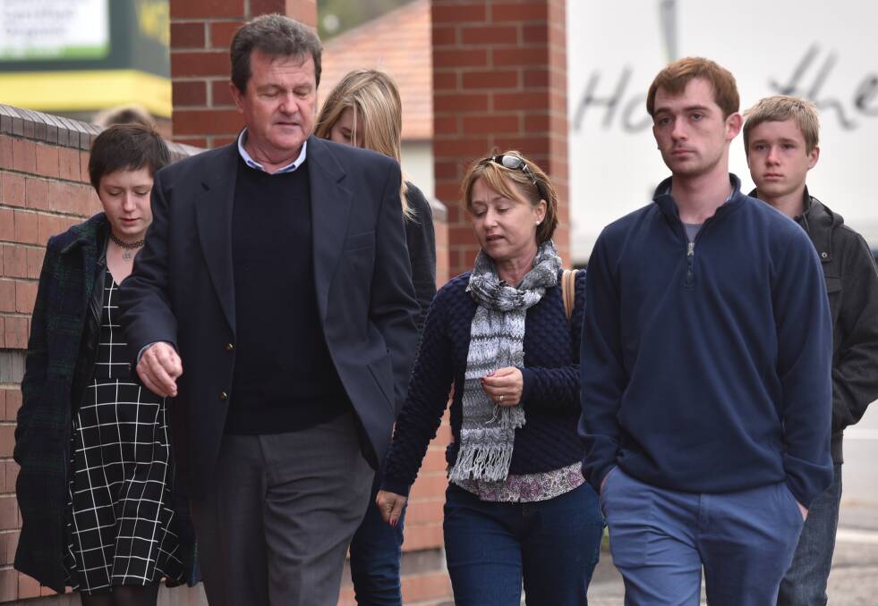 SENSELESS TRAGEDY: Senior Constable David Rixon's wife, Fiona, and children including Haley, Matthew and Patrick, and family friend, Bruce Scanlon outside Tamworth court yesterday. Photo: Geoff O'Neill