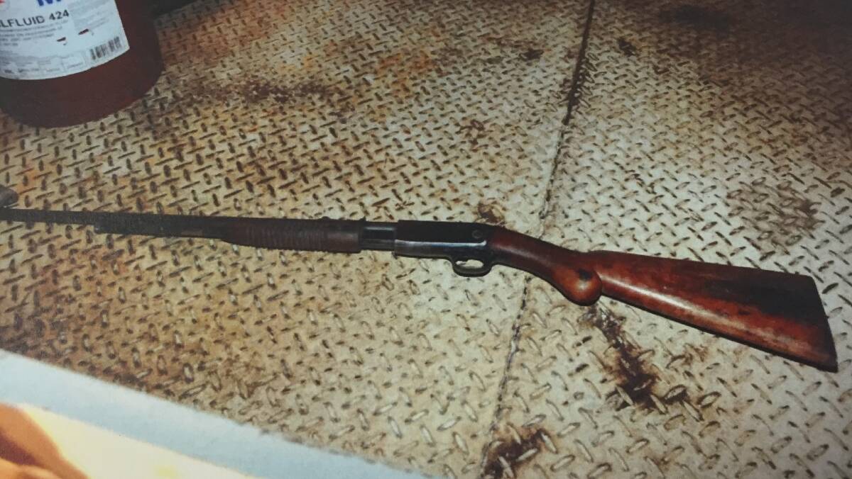 ALLEGED MURDER WEAPON: The .22 calibre Browning pump action rifle in the rear tray area of a white Nissan Patrol Turbo diesel utility. Photo: NSW Police