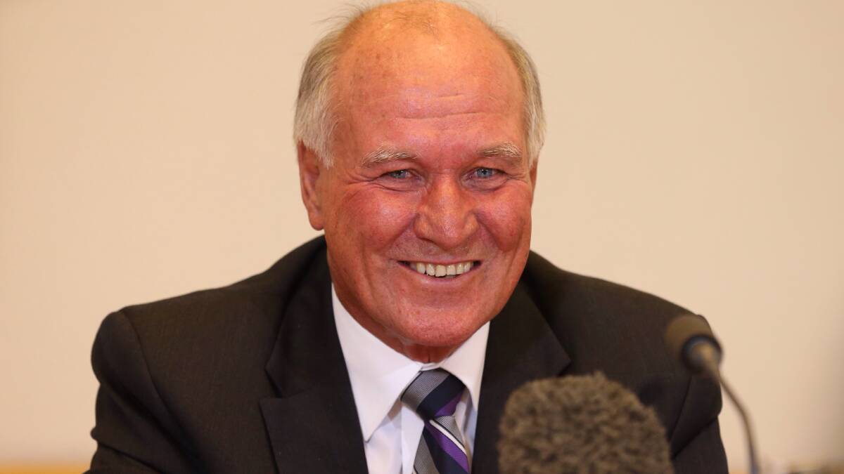 Tony Windsor, pictured addressing a coal seam gas talk in federal parliament in 2014, is considering running for the seat of New England again. Photo: Andrew Meares