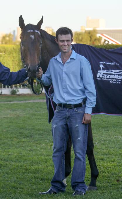 BETTER DAYS: Trainer Cody Morgan pictured with Prussian Secret after he won the 2013 Tamworth Cup. Photo: Geoff O’Neill