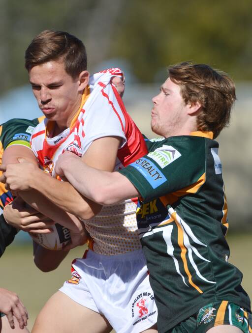 Tingha’s Billy Stewart Takes this tackle during the recent Greater Northern Regional Championships in Tamworth. The Tingha back was named on the wing for the Greater Northern Tiger Under 18s after Group 19 won the Brazier Shield at Tamworth.  
Photo: Barry Smith 170514BSB22