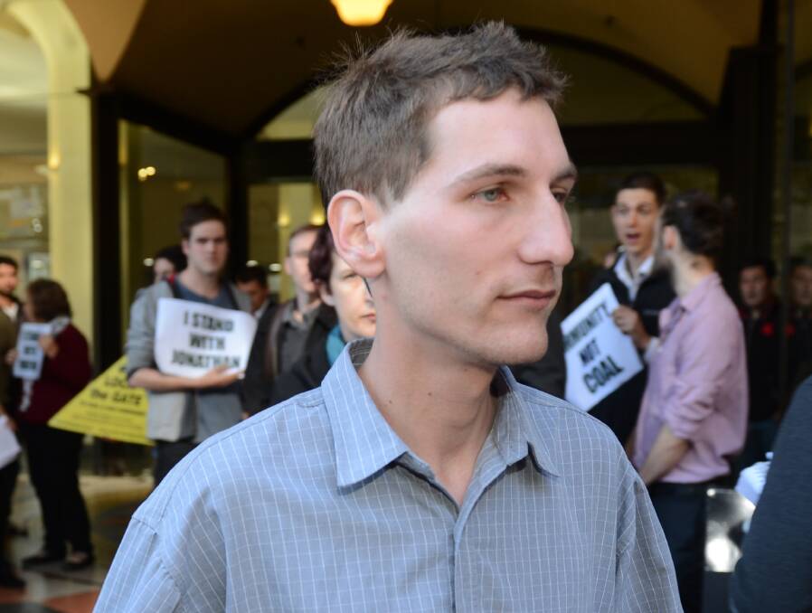 FATE KNOWN TODAY: Environmental activist Jonathan Moylan, pictured leaving court last year, will be sentenced today after pleading guilty to a hoax that temporarily wiped about $314m off Whitehaven Coal’s sharemarket value. Photo: Dean Lewins