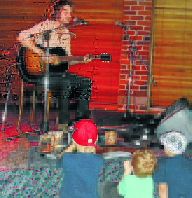 KID MAGNET: Lachlan Bryan was king of the kids – as well as delighting the rest of his audience – last Friday night at The Pub during his Common Grounds tour with Harmony James. Photo: Anna Rose
