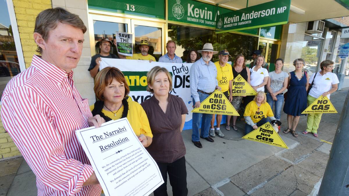 HEAR OUR CRIES: Concerned locals Phil Herbert, Jan Bryant and Carmel Flint say the National Party has let its constituents down with its pro-coal seam gas stance. Photo: Barry Smith 130314BSA03