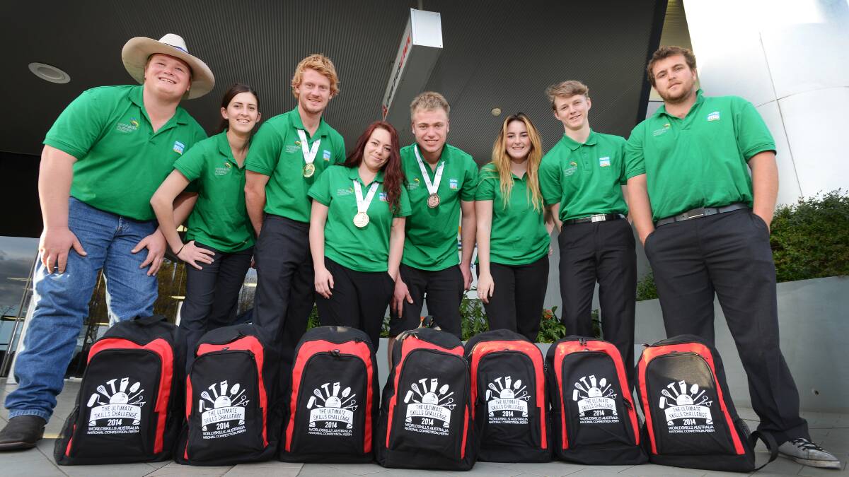 TOP JOB: The region’s WorldSkills team of, from left, Keagan Size, Krystal Cagney, Kane Girard, Lucy Whitehurst, Alex Cormack, Jessica Rindfleisch, Derek Gee and Jackson Bramley at Tamworth Airport yesterday after their return from Perth. Photo: Barry Smith 220914BSD06