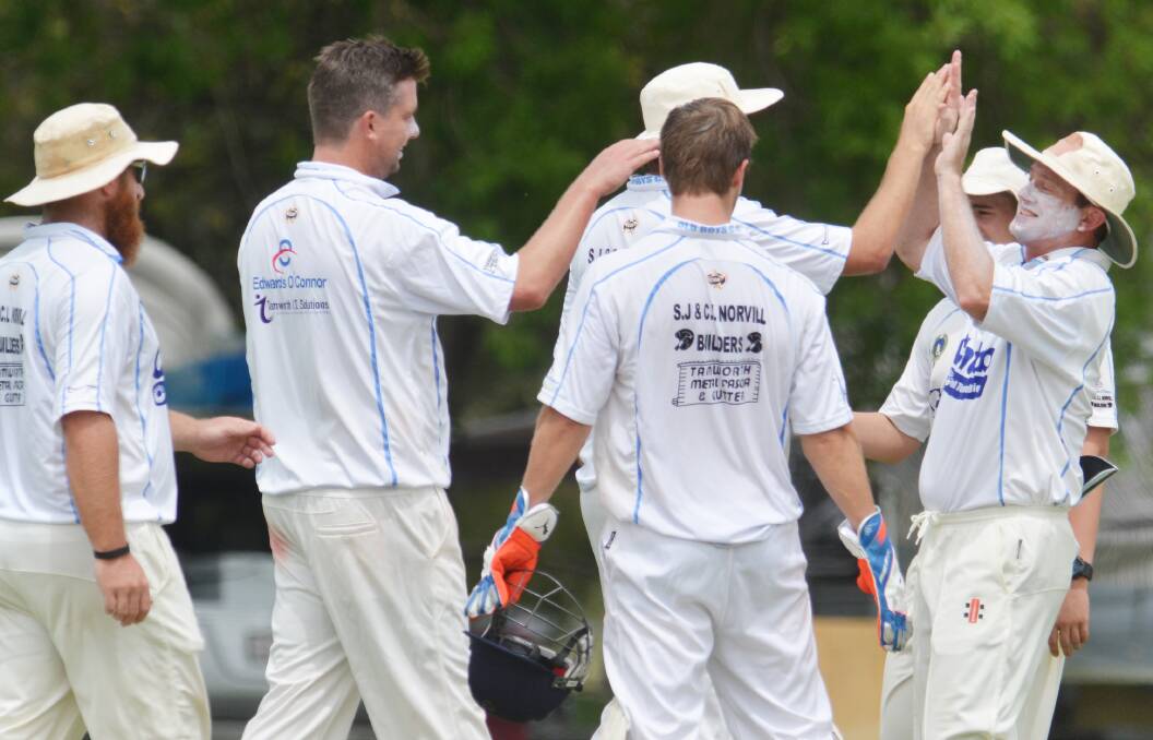 Ben Middlebrook (second from left) celebrates a wicket for Old Boys in a season of success for him and the club. Photo: Barry Smith 100115BSD15