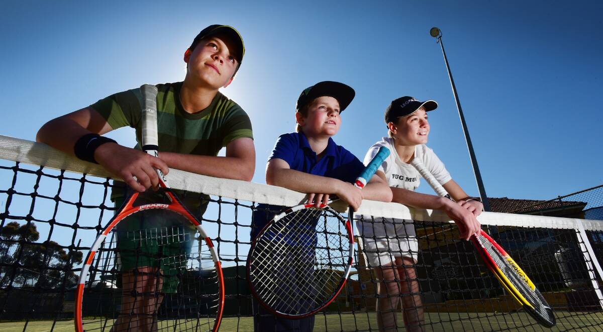 WHAT A RACQUET: Talented local tennis players Rory Cameron, 12, Josh Viertel, 11, and Jackson Worley, 12, are not impressed with the belligerent behaviour of Australian ace Nick Kyrgios at Wimbledon. Photo: Gareth Gardner 070715GGB02