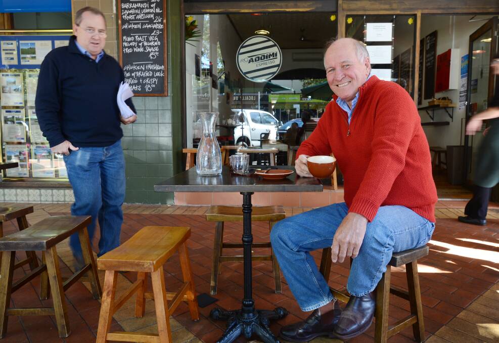 BOOK WORMS: Former federal politician Tony Windsor takes a coffee break with long time political executive assistant Graham Nuttall as they collate the
background stories for another book. Photo: Barry Smith 060514BSC06  