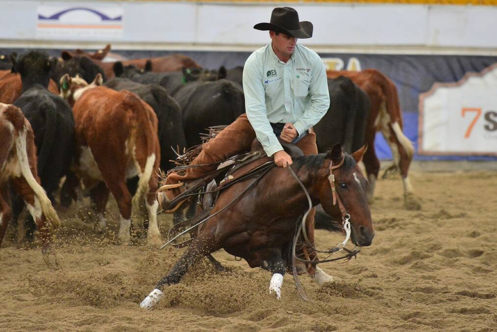 Dean Holden and Six Spins winning yesterday’s open NCHA title. Photo: Ken Anderson